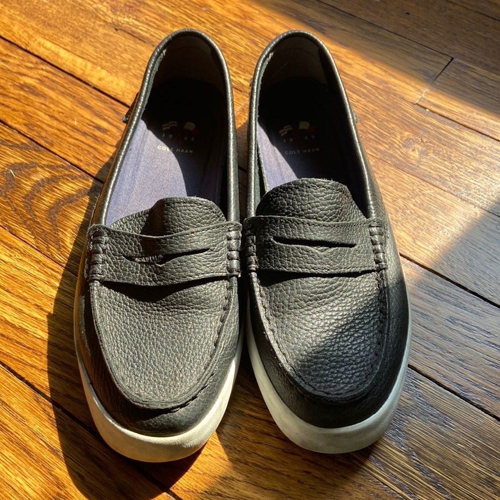Black with white sole, Cole Haan slip on shoes.